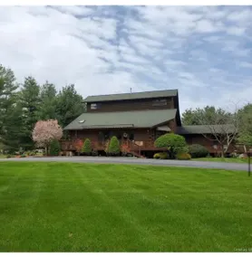 Spectacular Log Home Estate North Wing Unit - Image 2