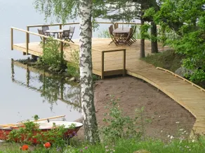 Lakefront house with beach, jetty, and rowing boat - Image 2
