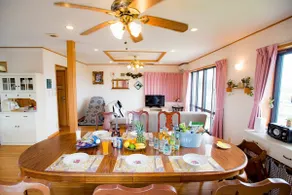 Spend a wonderful time on the balcony while looking out at the sea. URUMA STAY Country - Image 3