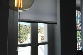 Stylish village home with patio & magnificent view - Image 4