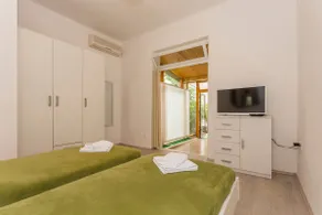 Comfortable modern studio with shaded patio - Image 4