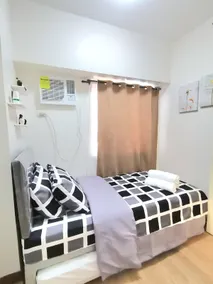 Cozy staycation in QC | 2BR | Wi-Fi | Parking - Image 4