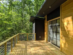 Modern cabin in the woods - Image 5