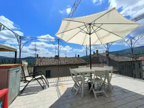 The rooftop terrace at Torniella Castle - Image 3