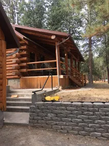 log cabin by lake in Pine Hollow Hot tub pizzaoven - Image 4