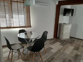 Al-Andalusí, Apartment with a double bed and a sofa. - Image 3
