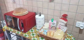 At Assunta's House - Image 3