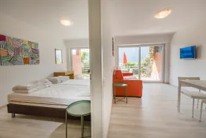 Two-room apartment overlooking the lake in a residence with swimming pool - Image 2