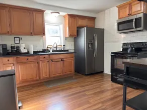 4BR St Paul Retreat • Near Lake Phalen • Sleeps 13 - Image 5