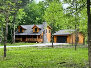 Authentic Log Cabin Nestled on Private Wooded Lot - Image 2