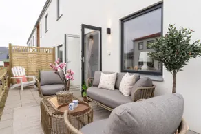 Earthy Ground Floor Home with Patio Sunbeds Greenery - Image 5