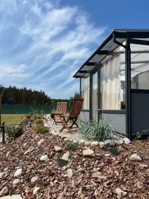 House on a hill with a tub near the forest - Image 2