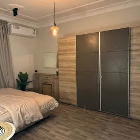 Apartment with a living room, two bedrooms and a kitchen with a different design - Image 4