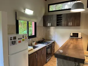 A home with a forest and beach - Image 2