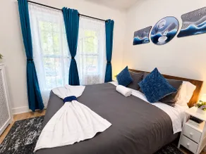 Hoboken Brownstone Gem with Sunroom | Mins to NYC - Image 4