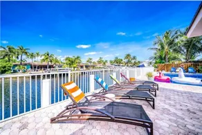 Easygoing Coastal Getaway Pool & Waterfront Patio - Image 3
