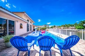 Easygoing Coastal Getaway Pool & Waterfront Patio - Image 4