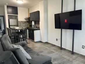 Work-Friendly Apartment with WiFi and A/C. - Image 3