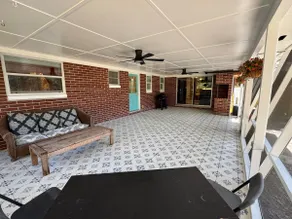 Boutique Mid-Century Home by Villages Fenced Yard - Image 4