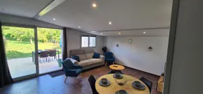 Quiet modern house with enclosed land - Image 3