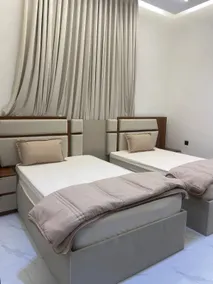 Two-bedroom apartment, living room, and a commercial street - Image 3