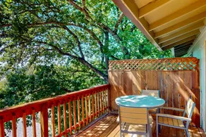 Upper level of duplex with a large deck & mountain - Image 2
