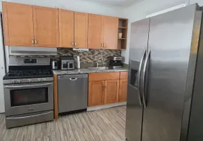 Spacious 1 Family Duplex with Driveway & Backyard - Image 2
