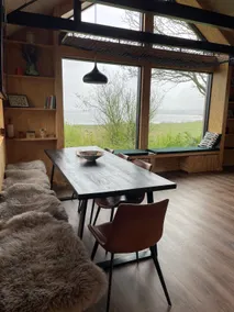 Modern wooden cabin overlooking a half-kilometer wide stretch of water - Image 3