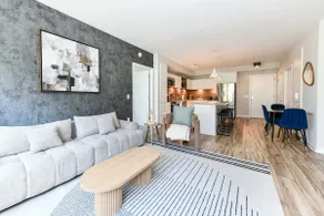 Sleek 2BR Residence with Gym, Parking & Rooftop De - Image 2