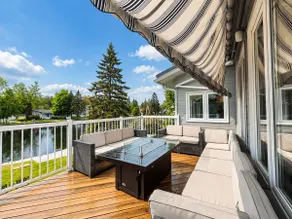 Canalside Summer Cottage with Waterview, Custom Bar, BBQ, and Fireplace - Image 3