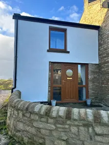 The Cowshed, a cosy home in a tiny village. - Image 2