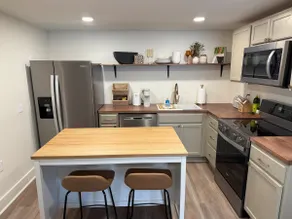 Safe Modern Studio Apartment | King Bed • Kitchen - Image 3