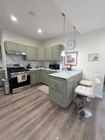 Modern 2BR Retreat with Full-Kitchen and Living - Image 3