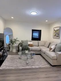 Modern 2BR Retreat with Full-Kitchen and Living - Image 2