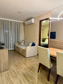 50” Flat-screen TV in the living room and TV in the bedroom - parking - Image 3