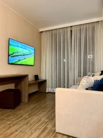 50” Flat-screen TV in the living room and TV in the bedroom - parking - Image 5