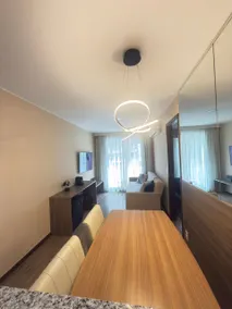 50” Flat-screen TV in the living room and TV in the bedroom - parking - Image 2