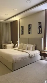 Room and living room (modern) with private garage entrance - Image 2