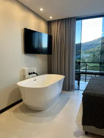 Suites at the foot of Morro - cabin, hotel and inn B - Image 3
