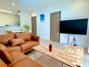 Uruma, Okinawa. Accommodates up to 9 people. BBQ. 1-minute walk to a natural beach. Comfortable stay in a spacious 3-room accommodation. - Image 4