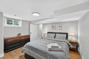 Bright and Modern 2BR Suite with Rustic Bar - Image 3