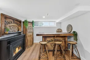 Bright and Modern 2BR Suite with Rustic Bar - Image 2