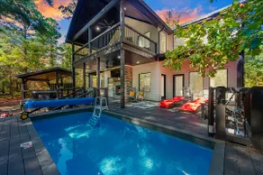 Heated Pool • Forest Views • Outdoor Cinema •Golf - Image 2