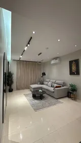 A hall, two bedrooms, and a kitchen 203 - Image 2