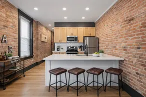 Exposed Brick • Bar Next Door • Laundry• Free WiFi - Image 3
