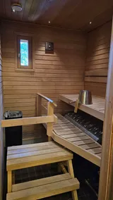 Arctic Hearth Levi | Sauna, fireplace & skibus - Image 5