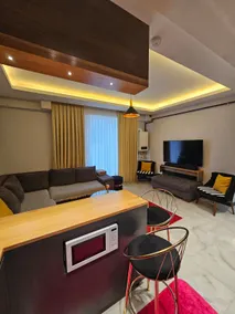 “Modern Luxury Apartment • LED Ambience • Central Location” - Image 5