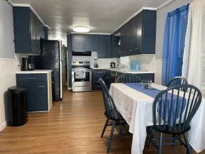 Safe & Quiet 3BR Cape: Sunroom Office - Image 3