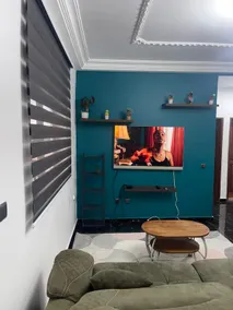 Chic Furnished 1 Bedroom Apartment Yaounde Living Room - Image 4