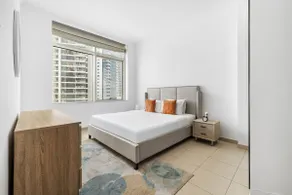 1BR Apartment with Balcony & Marina Views - Image 2